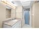 Bathroom with granite countertop vanity and shower at 2025 Sylvester Rd # C4, Lakeland, FL 33803