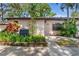 Condo exterior showcasing landscaping and entrance at 2025 Sylvester Rd # C4, Lakeland, FL 33803