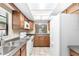 Eat-in kitchen with ample cabinet space and stainless steel appliances at 2025 Sylvester Rd # C4, Lakeland, FL 33803
