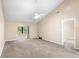 Living room with vaulted ceiling and fan at 2025 Sylvester Rd # C4, Lakeland, FL 33803