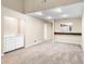 Living room with wet bar and access to hallway at 2025 Sylvester Rd # C4, Lakeland, FL 33803