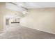 Living room with high ceilings and a view of the kitchen at 2025 Sylvester Rd # C4, Lakeland, FL 33803
