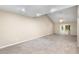 Spacious living room with high ceilings and carpet at 2025 Sylvester Rd # C4, Lakeland, FL 33803