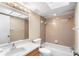 Bathroom with a tub, toilet and vanity at 2025 Sylvester Rd # C4, Lakeland, FL 33803