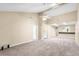 Spacious living area with high ceilings and access to other rooms at 2025 Sylvester Rd # C4, Lakeland, FL 33803