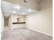 Living room with wet bar and view of kitchen at 2025 Sylvester Rd # C4, Lakeland, FL 33803