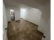 Simple bedroom with tile floors and access to bathroom at 143 D St, Lake Wales, FL 33853
