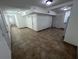 Spacious living area with tile floors and access to rooms at 143 D St, Lake Wales, FL 33853