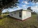 Newly renovated house exterior with fresh paint and landscaping at 143 D St, Lake Wales, FL 33853