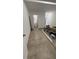 Unfinished basement area with tiled floors and lots of storage space at 143 D St, Lake Wales, FL 33853