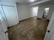 Bright bedroom featuring tile floors and access to bathroom at 143 D St, Lake Wales, FL 33853