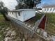 Newly renovated home with a fenced yard and walkway at 143 D St, Lake Wales, FL 33853