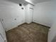 Laundry area with tile floors and double doors at 143 D St, Lake Wales, FL 33853