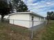 Newly renovated house exterior with fresh paint and landscaping at 143 D St, Lake Wales, FL 33853