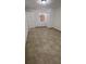 Spacious bedroom with tiled floors and ample closet space at 143 D St, Lake Wales, FL 33853