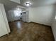 Bright kitchen with white cabinets, tiled floor, and appliances at 143 D St, Lake Wales, FL 33853
