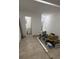 Clean hallway with new flooring and access to bathroom at 143 D St, Lake Wales, FL 33853