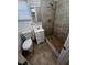 Updated bathroom with shower and tiled flooring at 143 D St, Lake Wales, FL 33853