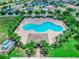 Aerial view of community pool with surrounding amenities at 800 Woodlark Dr, Haines City, FL 33844