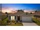 One-story house with a two-car garage and landscaped yard at 5600 Siltstone St, Lakeland, FL 33811