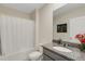 Clean bathroom with granite countertop and bathtub at 5600 Siltstone St, Lakeland, FL 33811