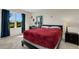 Cozy bedroom with a comfortable bed, dresser, and plenty of natural light at 5600 Siltstone St, Lakeland, FL 33811