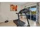 Home gym with treadmill and access to a private patio with hot tub at 5600 Siltstone St, Lakeland, FL 33811