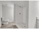 Clean bathroom with a shower and toilet at 401 Sw 1St Ave, Mulberry, FL 33860