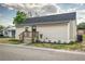 Tan house with a small front porch at 401 Sw 1St Ave, Mulberry, FL 33860
