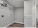 Laundry room with shelving and space for a washer and dryer at 401 Sw 1St Ave, Mulberry, FL 33860