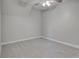 Well-lit bedroom with grey walls, ceiling fan, and carpeted floor at 401 Sw 1St Ave, Mulberry, FL 33860