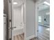 Clean bathroom with white subway tiles and a new bathtub at 401 Sw 1St Ave, Mulberry, FL 33860