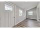 Bright entryway with hardwood floor and windows at 401 Sw 1St Ave, Mulberry, FL 33860