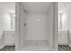 Large bathroom with a walk-in shower and double vanity at 401 Sw 1St Ave, Mulberry, FL 33860