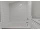 Bathroom with white subway tile and a new bathtub at 401 Sw 1St Ave, Mulberry, FL 33860