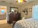 Bedroom with built-in dresser and a view of the kitchen at 3549 Old Bartow Rd, Lake Wales, FL 33859