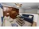 Comfortable office space with built-in shelving and seating area at 1144 Waterfall Ln # 26, Lakeland, FL 33803