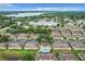 Aerial view of community featuring a pool and surrounding landscape at 519 Sandstone St, Lakeland, FL 33809