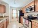 Well-equipped kitchen with granite countertops and ample cabinet space at 519 Sandstone St, Lakeland, FL 33809