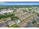 Aerial view showing multiple townhouses and a community pool at 519 Sandstone St, Lakeland, FL 33809