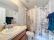 Clean bathroom with a shower/tub combo, vanity, and updated fixtures at 519 Sandstone St, Lakeland, FL 33809