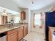 Bright kitchen with granite countertops and ample cabinetry at 519 Sandstone St, Lakeland, FL 33809