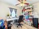 Home office featuring a desk, chair, and storage at 519 Sandstone St, Lakeland, FL 33809