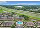 Aerial view showing townhomes, pool, and highway access at 519 Sandstone St, Lakeland, FL 33809