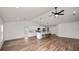 Open living room with hardwood floors and high ceilings at 840 Voight N Ave, Fort Meade, FL 33841