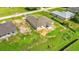 Aerial view of a new single-Gathering home on a large lot at 840 Voight N Ave, Fort Meade, FL 33841