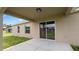 Covered back patio with sliding glass doors at 840 Voight N Ave, Fort Meade, FL 33841