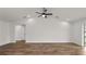 Bright and spacious living room with hardwood floors and a ceiling fan at 840 Voight N Ave, Fort Meade, FL 33841