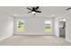 Spacious main bedroom with carpet flooring and en-suite bathroom access at 840 Voight N Ave, Fort Meade, FL 33841