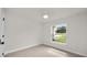 Bright bedroom with large window and ceiling fan at 840 Voight N Ave, Fort Meade, FL 33841